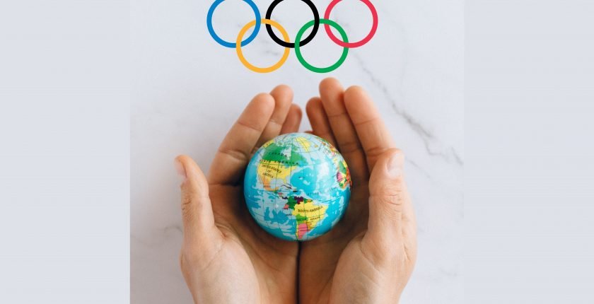 Olympic Rings - The World held in cupped hands