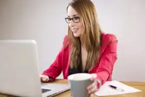 A young lady working on a laptop